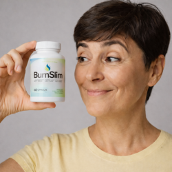 burn slim supplement product held by woman looking sidways